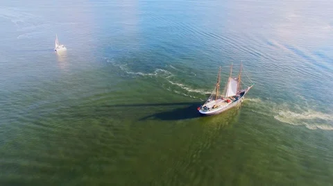 Sailing ship moving ocean sea river calm water Aerial flight 4k video background Stock Footage 65881984