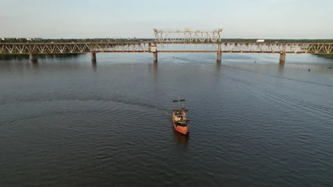 Sailing ship sails on the calm waters along the river bank in sunny weather Stock Footage 156861033
