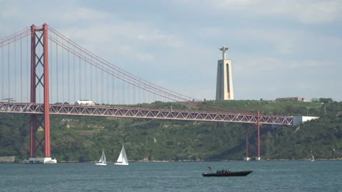 A sailing ship sails through the waters of the Tejo River on the coasts of the Stock Footage 91165462