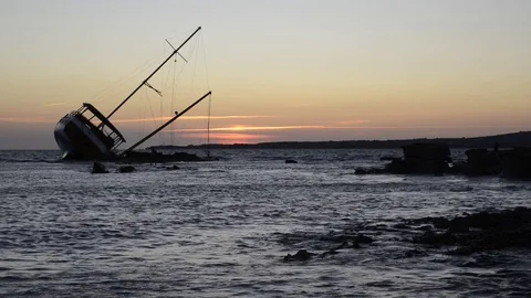 Sailing ship stranded on the rocks Stock Footage 80276164