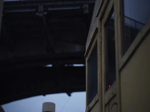 Sailing on the ship under a bridge at dusk Stock Footage 71861819