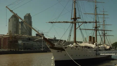 Sailing ship in the waters of Buenos Aires with city buildings Stock Footage 160280646