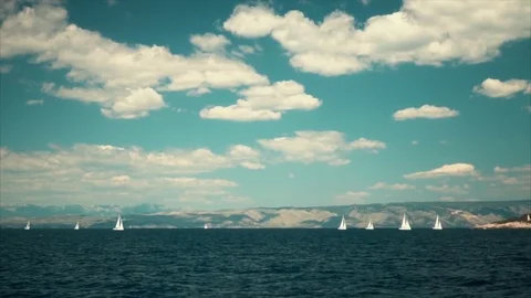 Sailing ships luxury yachts with white sails in the Sea Stock Footage