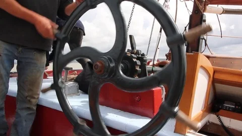 Sailing ship's wheel being turned 動画素材 70093280