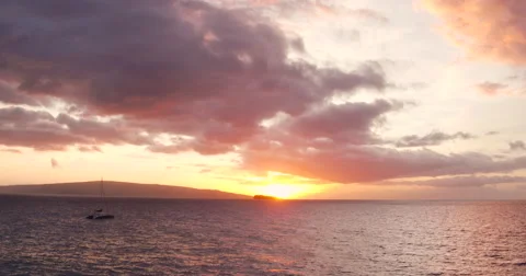 Sailing into the Sunset. Aerial View Flying Over Sail Boat Video stock 57134448