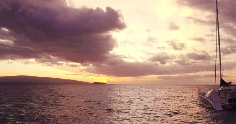 Sailing into the Sunset. Aerial View Flying Over Sail Boat Video stock 57134772
