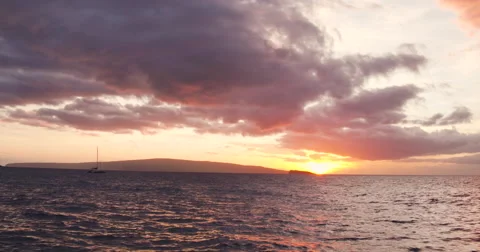 Sailing into the Sunset. Aerial View Flying Over Sail Boat Video stock 57135180