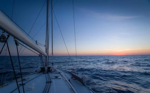 Sailing at sunset 写真素材