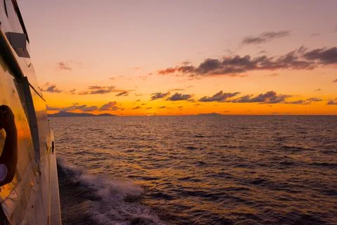 Sailing into the sunset Stock Photos