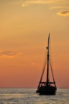 Sailing off into the Sunset Stock Photos