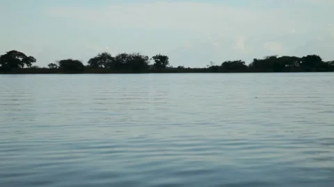 Sailing through calm waters of Amazon River, Obidos, Para. Passenger POV Video stock 261943463