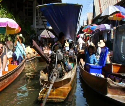 Sailing through Thailand floating market Stock Footage