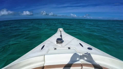 Sailing Through Turquoise Paradise Caribbean sea From a Boat Bow POV Stock-Footage 334640557