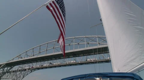 Sailing under bluewater bridge.mp4 Stock Footage 1048112