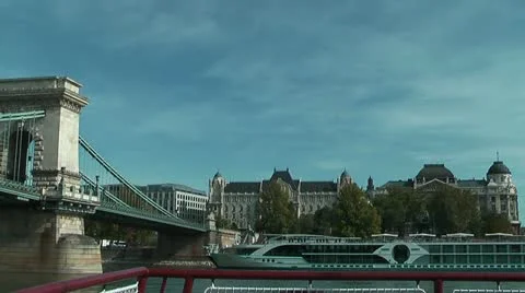 Sailing under  the chain bridge in budapest on the danube Stock Footage 14822562