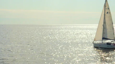 Sailing under the sunset Stock Footage 56312857