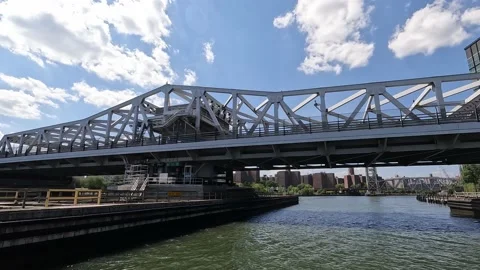 Sailing Under the Third Avenue Bridge in NYC on the Harlem River Timelapse Stock Footage 219162539