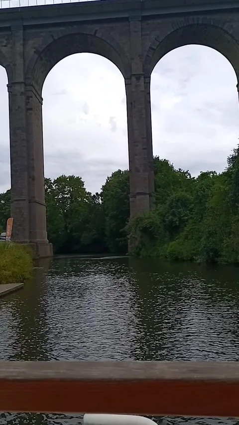 Sailing under the viaduct Stock Footage 314109341