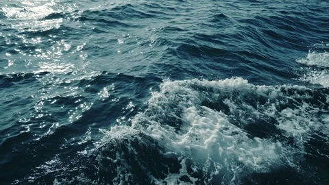 Sailing in the wind through the waves during sunset HD Sailing boat shot in at Stock Footage 123285991