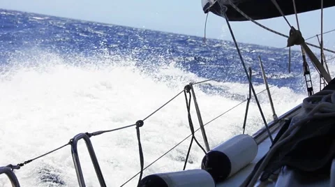 Sailing in the wind through the waves. Stock Footage 49090876