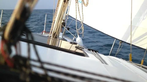 Sailing in the wind through the waves. Sailing boat shot at the Mediteranean sea Vídeo Stock 60592839