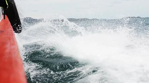 Sailing in the wind through the waves on sunny day in summer with water splas Stock Footage 64127646