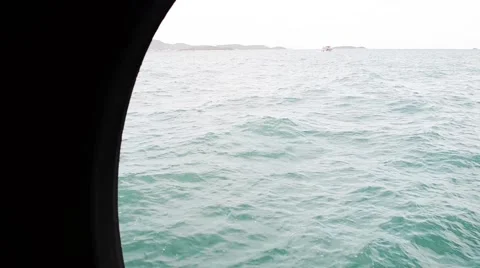 Sailing in the wind through the waves on sunny day in summer with water splas Stock Footage 64127876