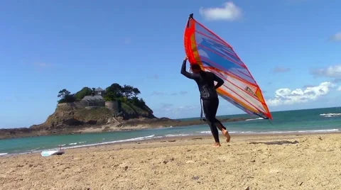 Sailing windsurfer prepares the equipement Stock Footage 67180619