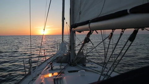 Sailing Yacht Deck Facing Golden Sunset on Mediterranean Sea in Corsica Stock Footage 340338443