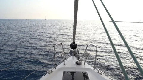 Sailing yacht forward view making way thru the water Stock Footage 120170533