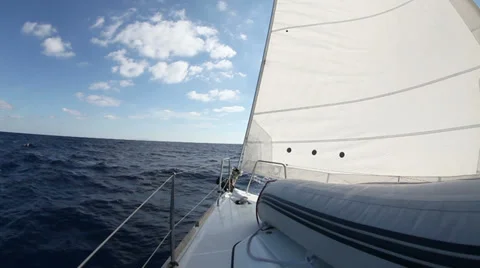 Sailing yacht on the race in blue sea Stock Footage