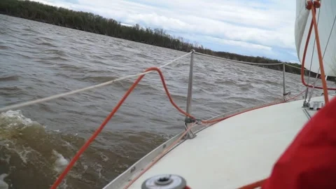 Sailing yacht in rough river waves. Amur river, Russia Stock Footage 304966022