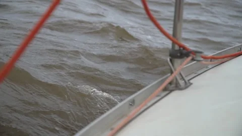 Sailing yacht in rough river waves. Amur river, Russia Stock Footage 304966037