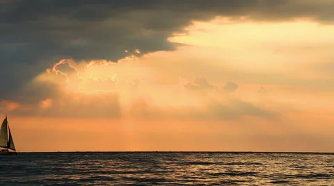 Sailing yacht sailing fast on the sunset background Stock Footage 63662471