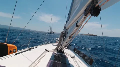 Sailing Yacht Speeds Ahead Under Billowing Sails. Summer Vacation and Yacht.. Stock Footage 272452753