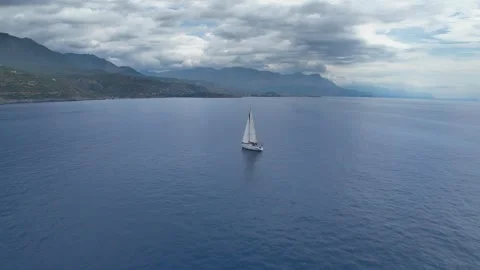 Sailing Yacht Under Storm Clouds in Messinian Gulf Stock Footage 336706019