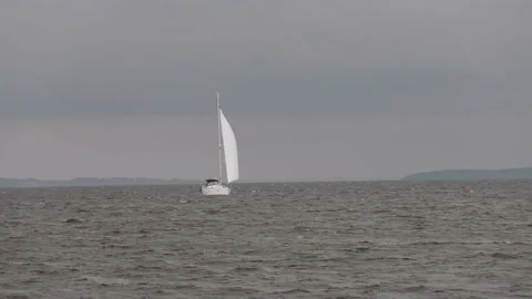 Sailing yacht in wind waves Stock Footage 209661708