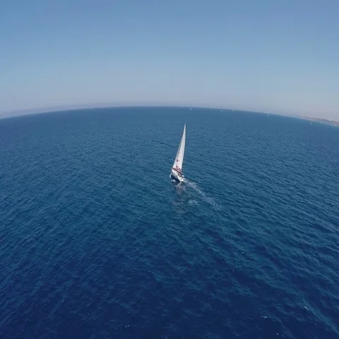Sailing yachts with white sails in the open Sea. Drone view - birds eye angle Stock-Footage 69306425