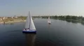 Sailing yachts on wide river, aerial view. Active rest, vacation HD Footage