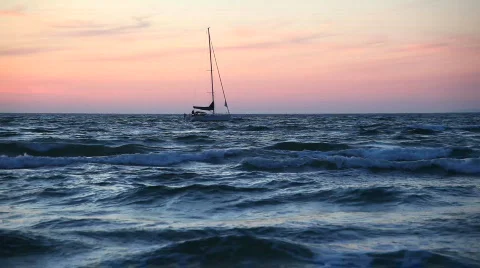 Sailingboat at sunset Stock Footage 855122
