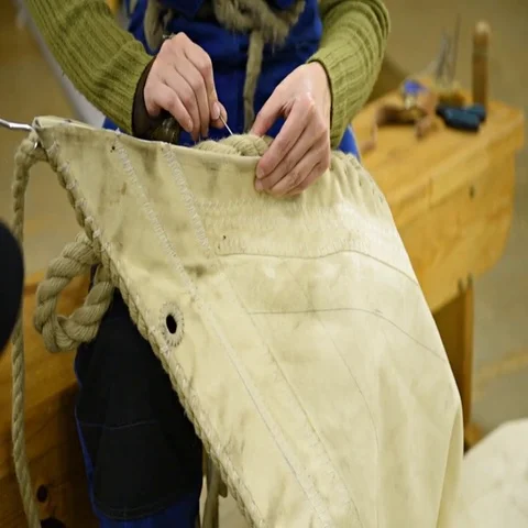 Sailmaker at work Stock Footage 69512628