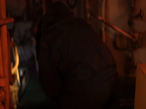 Sailor in the engine room checks, ship equipment Stock Footage 71872606