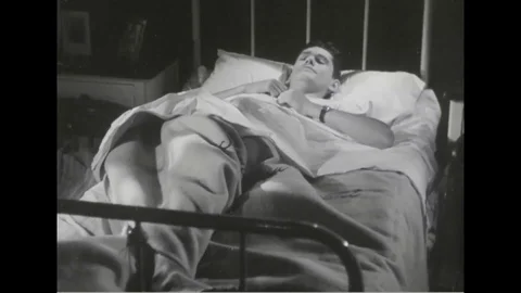 Sailor feel depressed on bed tossing and turning - 1945 Stock Footage 101407406