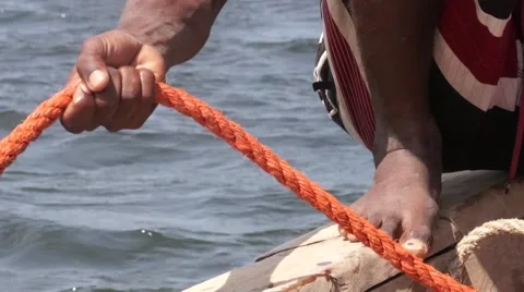 Sailor lets rope overboard, Kenya Video stock 47190458