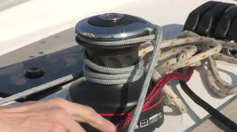 Sailor maneuvering on winch  Stock Footage 38192277