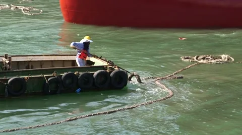 Sailor Picks Up The Rope On A Boat Stock Footage 63988616
