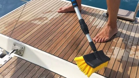Sailor washing the deck of a sailing -2 Stock Footage 270232616