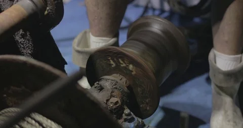 Sailor working with electric pulley winch on a boat Stock Footage 76678428