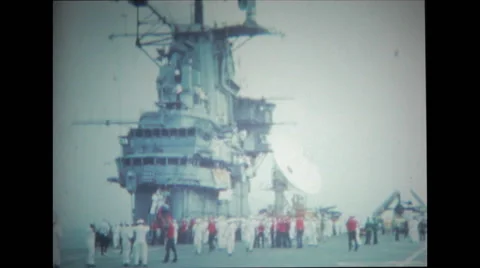 Sailors and ground crew walking on the flight deck of USS Wasp Stock Footage 37596404