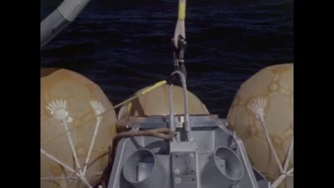 Sailors attach hook and winch to Apollo 8 Command Module during recovery  Stockbeeldmateriaal 271519265